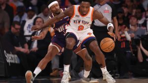 Anunoby keeps rolling in Brunson's return as Knicks beat Suns 112-98 to reach 50 wins again