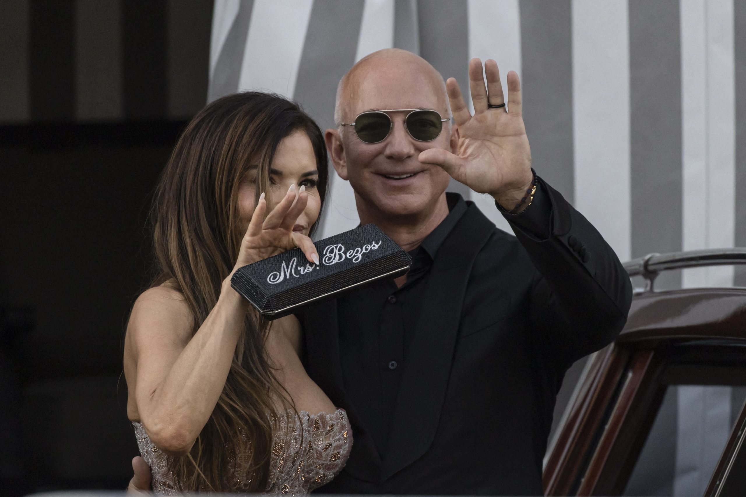 Lauren Sánchez Shares New Name On Clutch, “Call Me Mrs. Bezos”