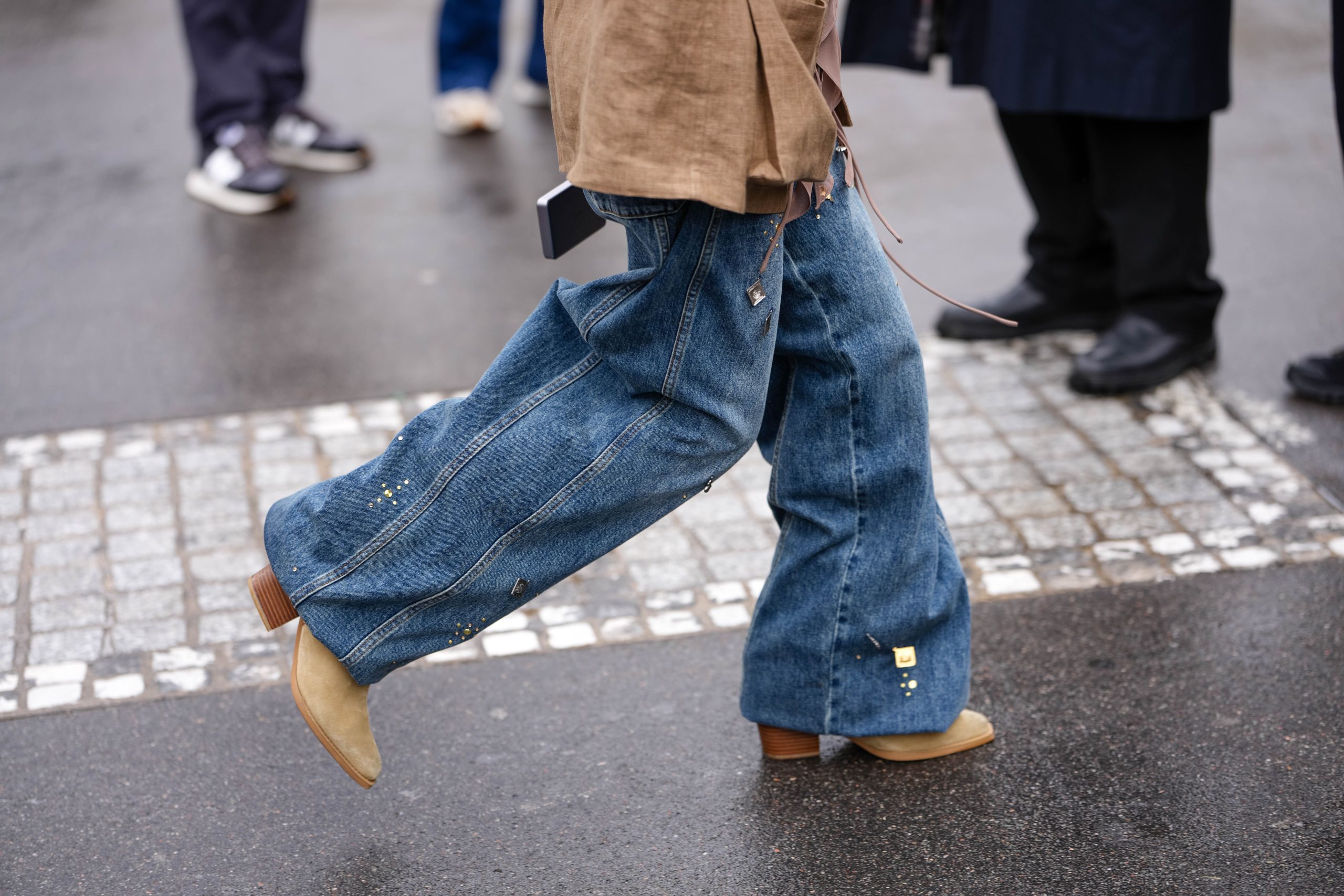 What Boots Fashion Pros Will Be Wearing With Wide-Leg Jeans in Fall 2025