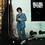 Why Billy Joel always wore a jacket and tie on stage — and never looked back