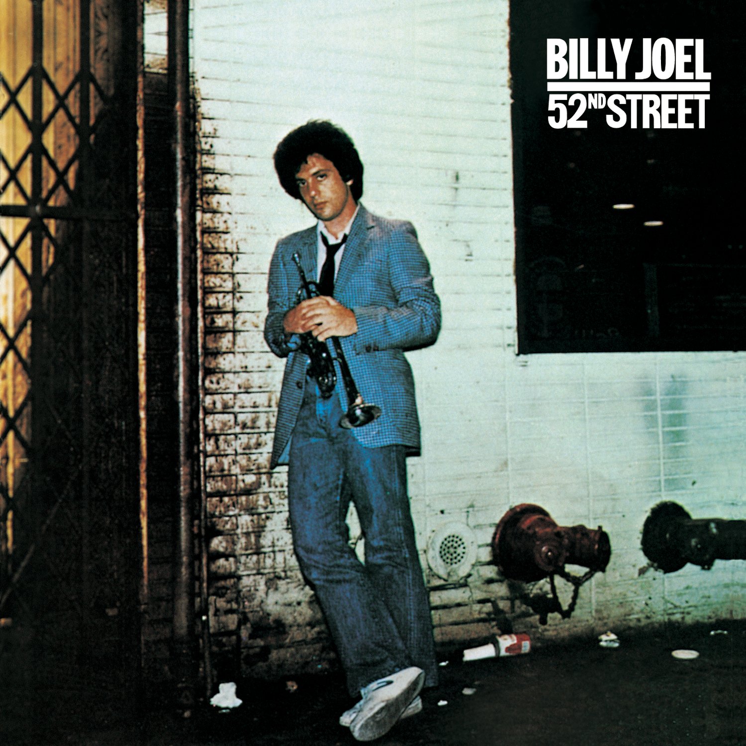 Why Billy Joel always wore a jacket and tie on stage — and never looked back
