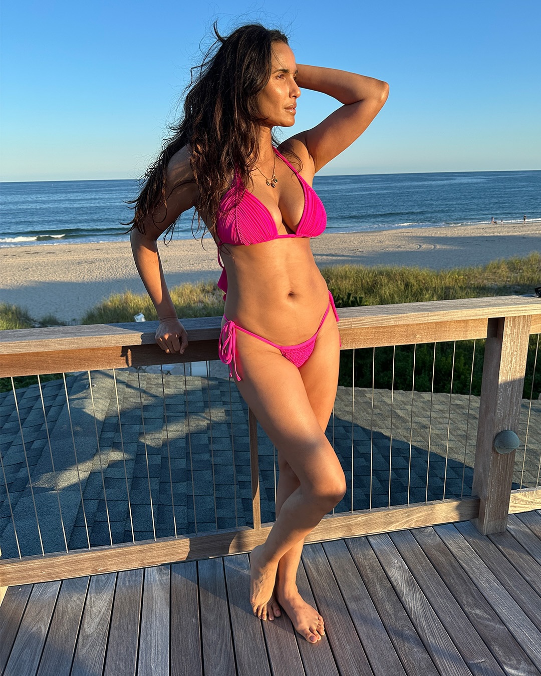 Padma Lakshmi, 54, rocks hot pink string bikini after bigger breast reveal