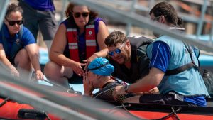 Top triathlete called an ‘absolute warrior’ after moving dislocated shoulder back DURING swim