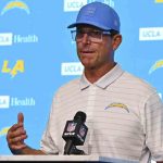 Harbaugh refuses to comment after NCAA levies heavy penalties on Michigan