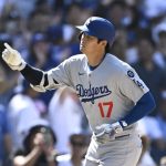 Ohtani high-fives a heckler after his homer to cap Dodgers’ comeback rivalry win over Padres