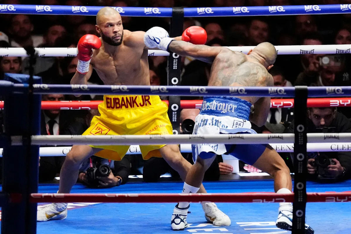 Benn dominates Eubank Jr. to earn bragging rights in British boxing's family feud